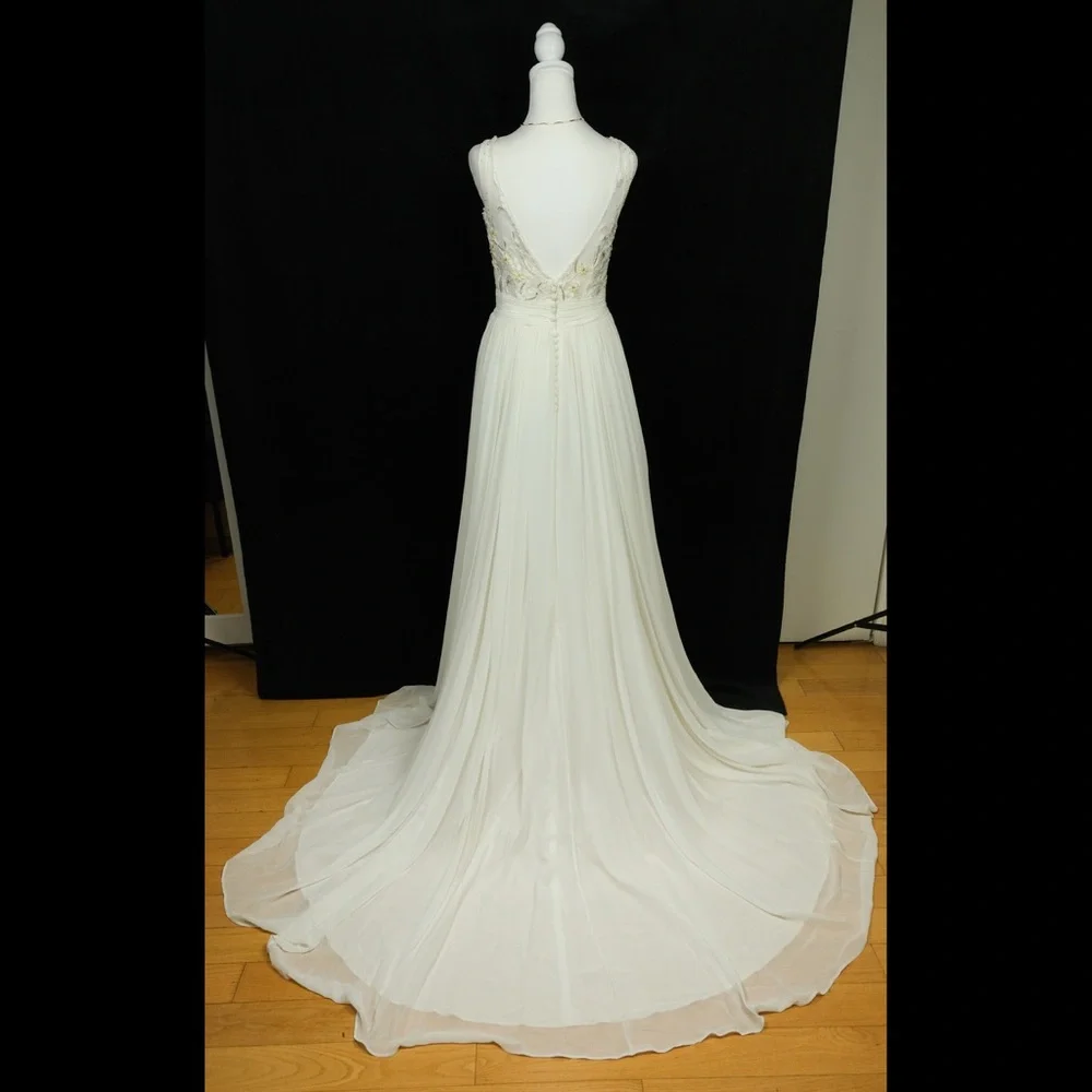 Preowned ivory and sand wedding gown dress. Size S. Very high quality. Size S - Picture 7 of 8